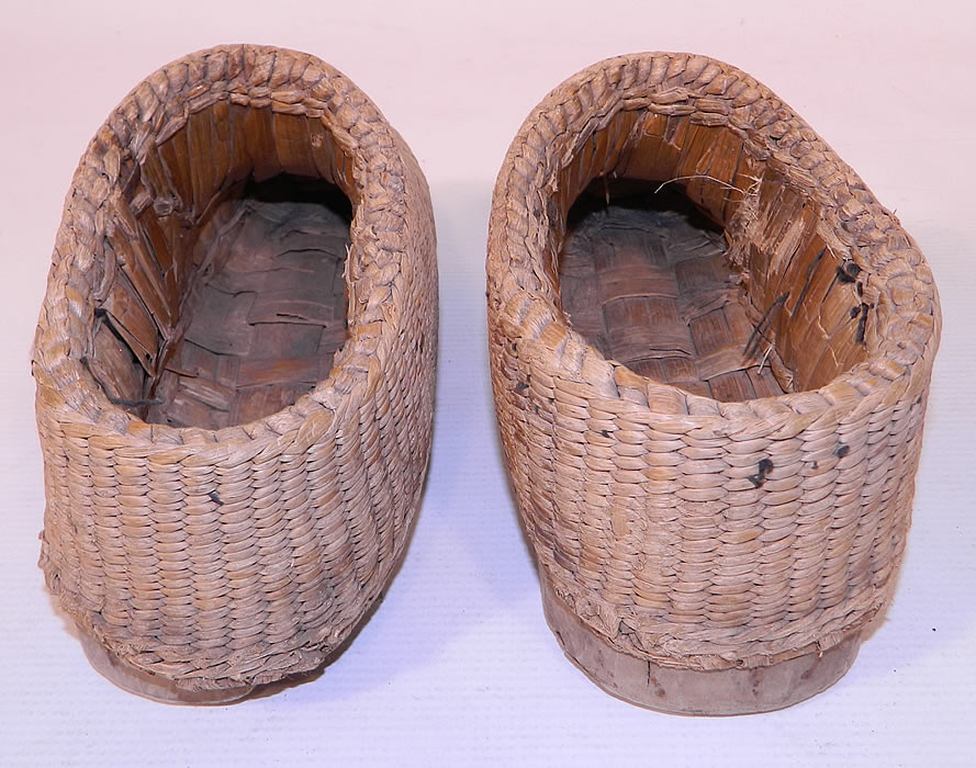 Antique Chinese Woven Braided Straw Hand Carved Wooden Farmers Shoes. This style of shoe was worn by the people in the Shandong Province of China. 