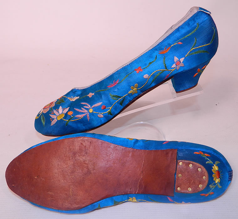 Antique Chinese Royal Blue Silk Embroidered Floral Slipper Shoes. They have been gently worn and are in excellent condition. These are a wonderful piece of wearable antique Chinese textile art! 