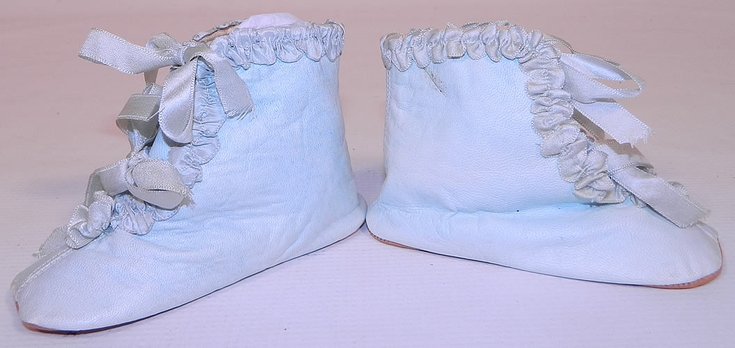Unworn Victorian Antique Blue Kid Leather Silk Ribbon Baby Boots Infant Shoes. The shoes measure 3 inches tall, 5  inches long and 2 inches wide. 