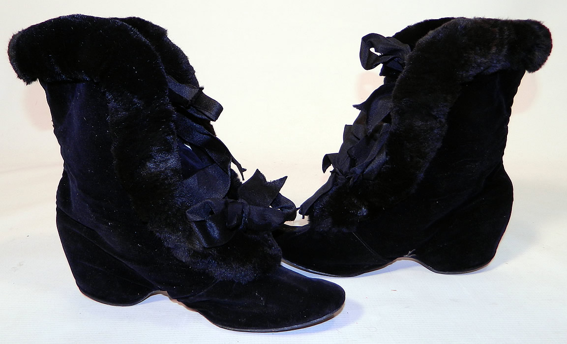 Victorian Black Velvet Fur Trim Winter Carriage Boots. These charming carriage winter snow boots are fully lined in a cream color cotton quilted fabric for warmth, with black silk ribbon ties down the front for closure and hard leather bottom soles. 