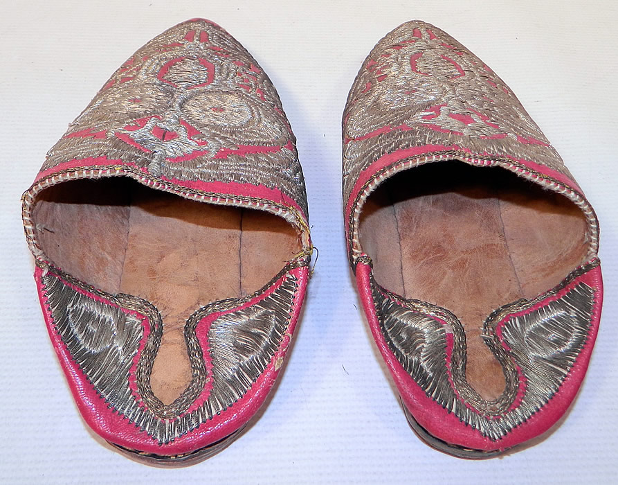 Vintage Moroccan Ladies Mules Cherbil Metal Embroidery Red Leather Slipper Shoes. The shoes measure 10 inches long and 3 inches wide. They are in good condition and have been gently worn. 