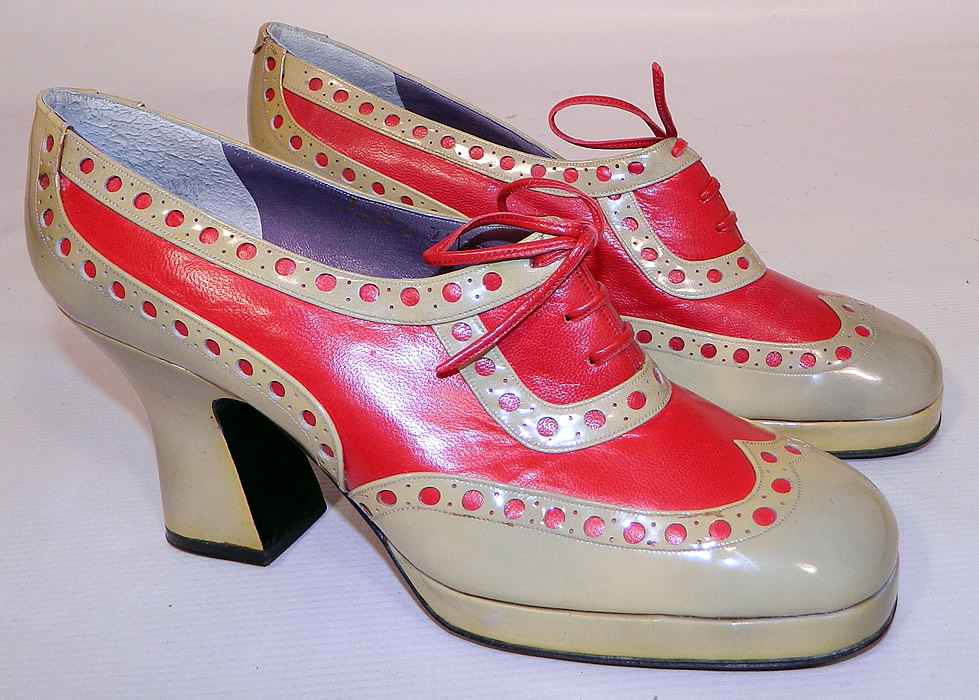 Unworn Vintage Jerry Edouard Joseph Red Eyelet Leather Oxford Platform Shoes & Box. They are made of a two tone red and ecru cream color leather with decorative eyelet punch work designs.