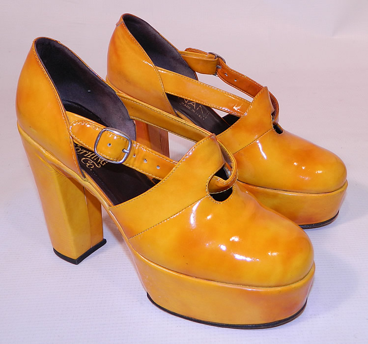Vintage Mignani Right Bank Clothing Yellow Patent Leather Platform Shoes. This pair of vintage Mignani Right Bank Clothing yellow patent leather platform shoes date from the 1970s. The shoes measure 9 1/2 inches long, 3 inches wide, with 4 1/2 inch high heels.