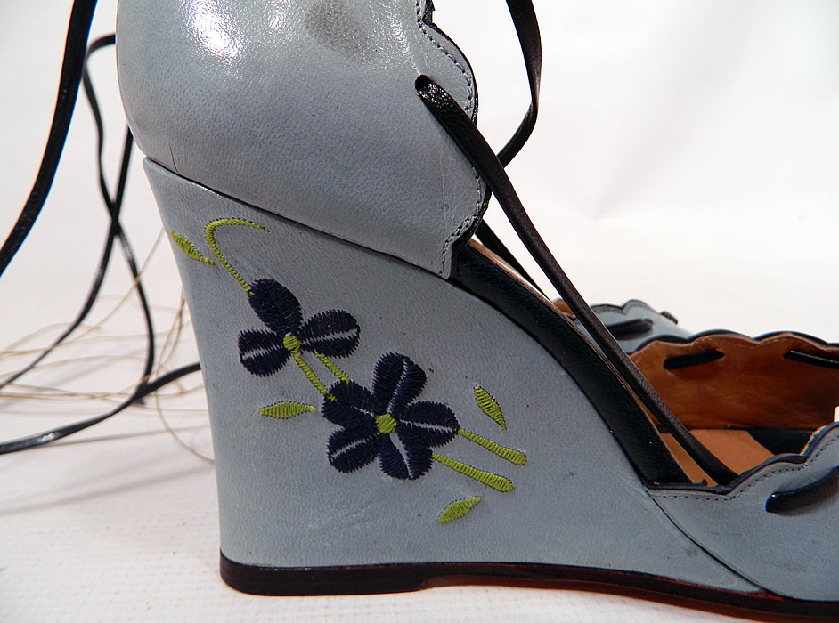 Vintage Shoes by Ivory Blue Leather Floral Embroidery Ankle Strap Wedge Heel. These stunning summer sandal style shoes have open toes, scalloped trim edging, with lacing woven through it, wrap around ankle straps and wedge style high heels.