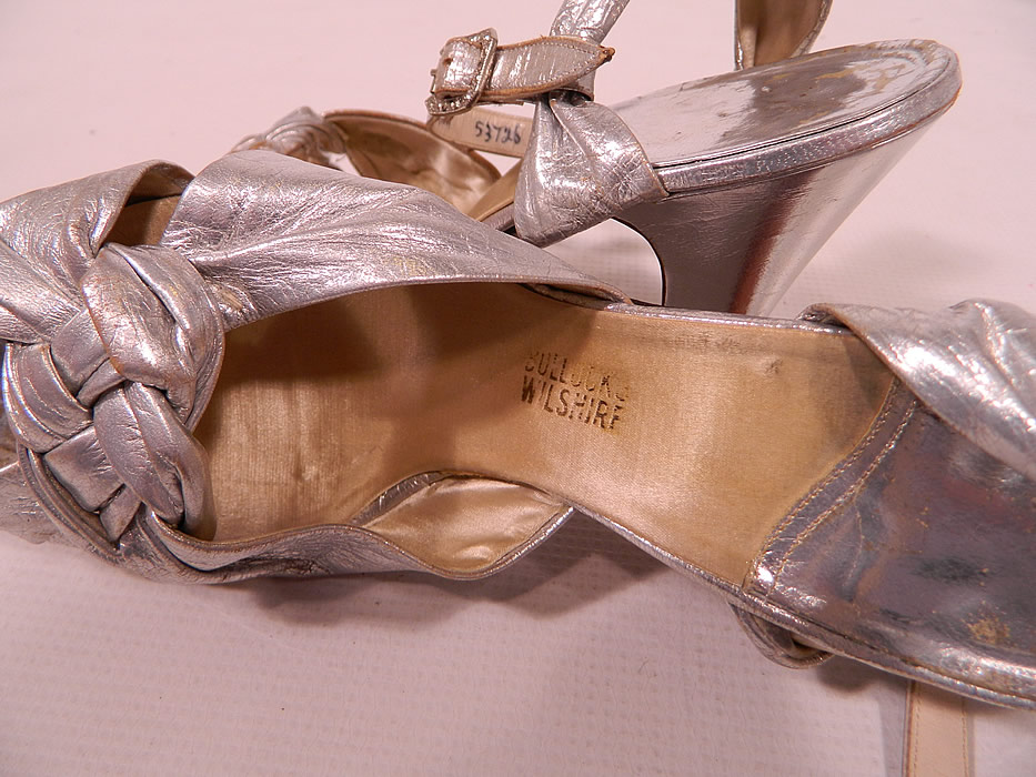 Vintage Bullock's Wilshire Silver Lam&eacute; Lame Leather Ankle Strap Evening Dance Shoes 
There are silver lining insoles stamped with a "Bullock's Wilshire" store label inside. 