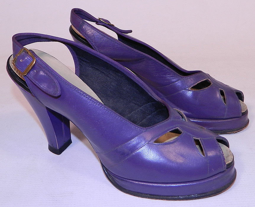 Vintage Alyson Style Classics Purple Leather Slingback Platform Shoes
They are made of a purple leather, with an eyelet cut out pattern design on the front instep vamps.