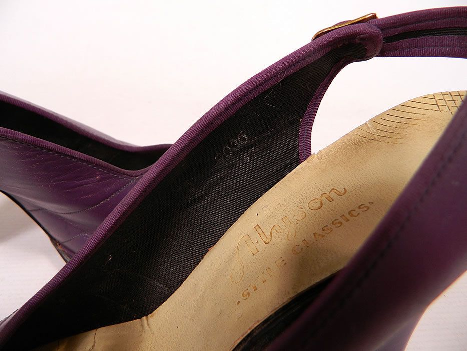 Vintage Alyson Style Classics Purple  Leather Slingback Platform Shoes
The shoes measure 10 inches long, 3 1/4 inches wide, with 4 inch high heels and are approximately a size 7. They are in good condition and have been gently worn. These are truly a wonderful piece of quality made wearable shoe art!