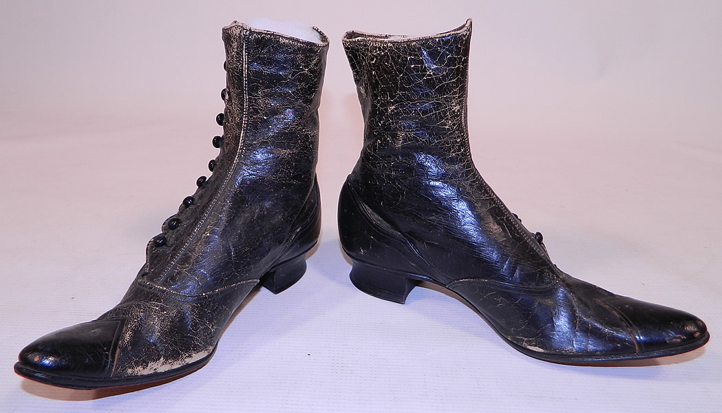 Unworn Victorian Scalloped Side Button Black Leather High Top Boots
One shoe button is missing from the top. These are truly a beautiful quality made antique Victorian boot!
