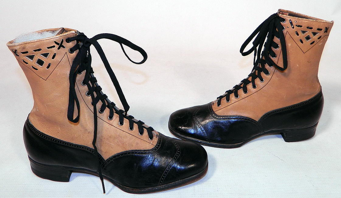 Edwardian Black & Tan Two Tone Leather Lacing Cutouts High Top Boots Shoes
The boots have the original black shoe string laces, rounded toes and low stacked black wooden cube heels. The boots measure 8 inches tall, 10 inches long, 3 inches wide, with 1 inch high heels.