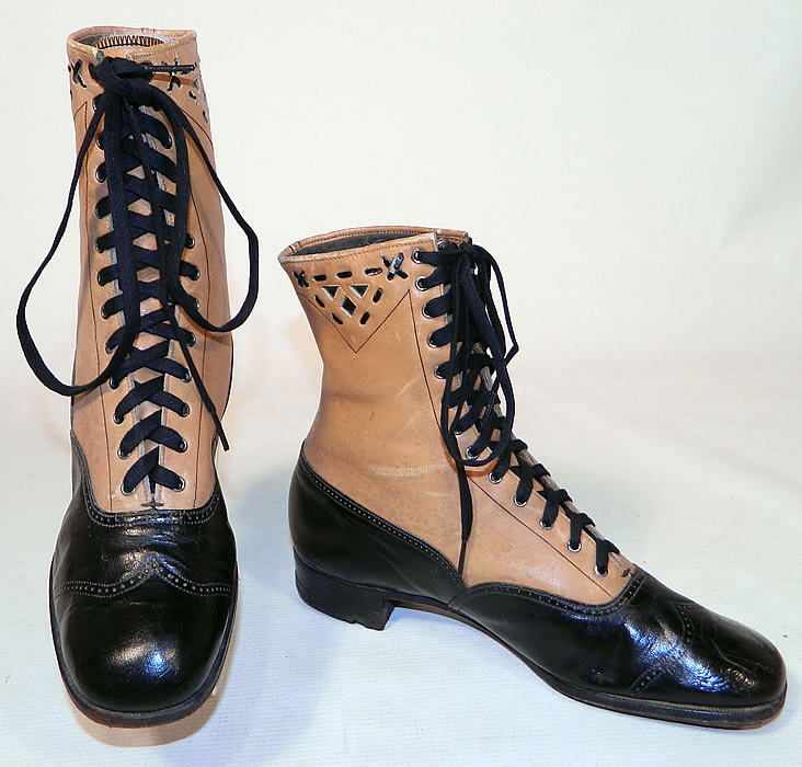 Edwardian Black & Tan Two Tone Leather Lacing Cutouts High Top Boots Shoes
The boots measure 8 inches tall, 10 inches long, 3 inches wide, with 1 inch high heels. These antique boots are difficult to size for today's foot but my guess would be about a size 7 narrow width. 
