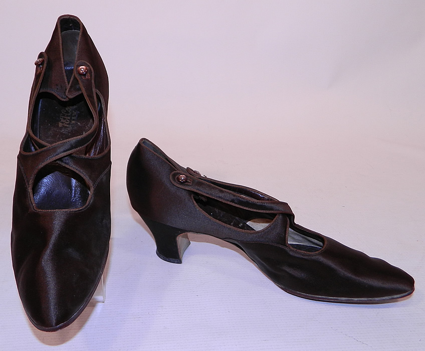 Vintage J&T Cousins Co NY Chocolate Brown Silk Button Strap Mary Jane Shoes
This pair of Edwardian era vintage J&T Cousins Co. New York chocolate brown silk button strap Mary Jane shoes date from 1915.