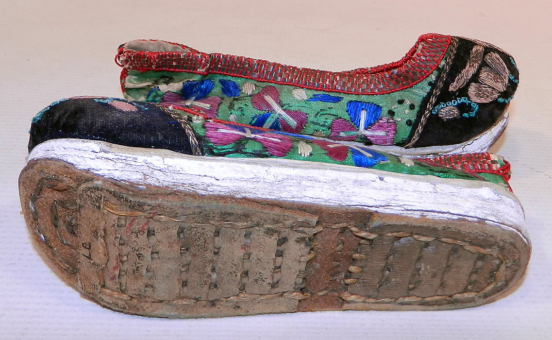 Antique Chinese Forbidden Stitch Embroidered Bound Foot Slippers Platform Shoes
These petite pair of slippers were worn by a women of leisure or for a special occasion. They are in good condition, with only some minor wear. These are truly a wonderful one of a kind piece of Chinese textile art which would make for a wonderful display piece!