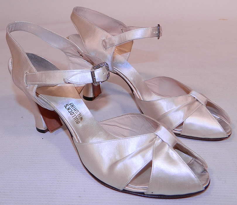 Vintage Bullock's Wilshire White Silk Satin Ankle Strap Evening Bridal Wedding Shoes
This pair of vintage Bullock's Wilshire white silk satin ankle strap evening bridal wedding shoes date from the 1930s.
