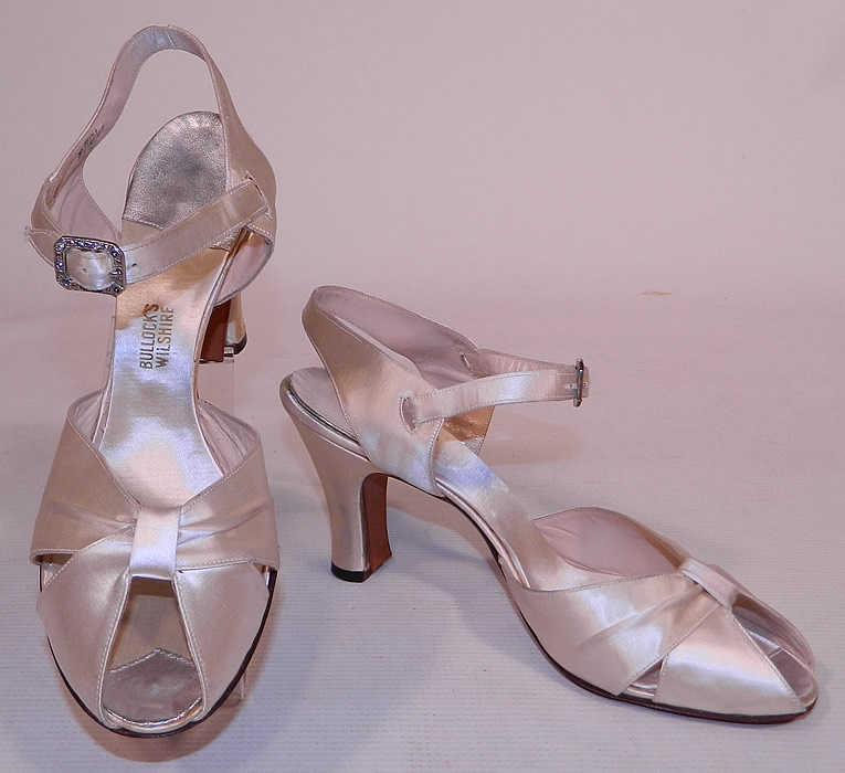 Vintage Bullock's Wilshire White Silk Satin Ankle Strap Evening Bridal Wedding Shoes
They are made of a white silk satin fabric.