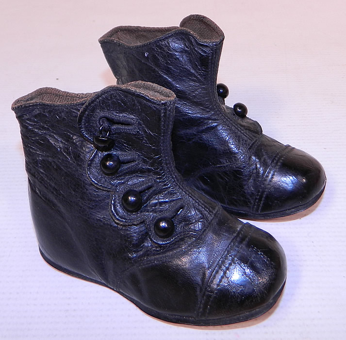 Victorian Antique Black Leather High Button Baby Boots Childs Shoes
The boots measure 3 1/2 inches tall, 4 1/2 inches long and are 1 1/2 inches wide.