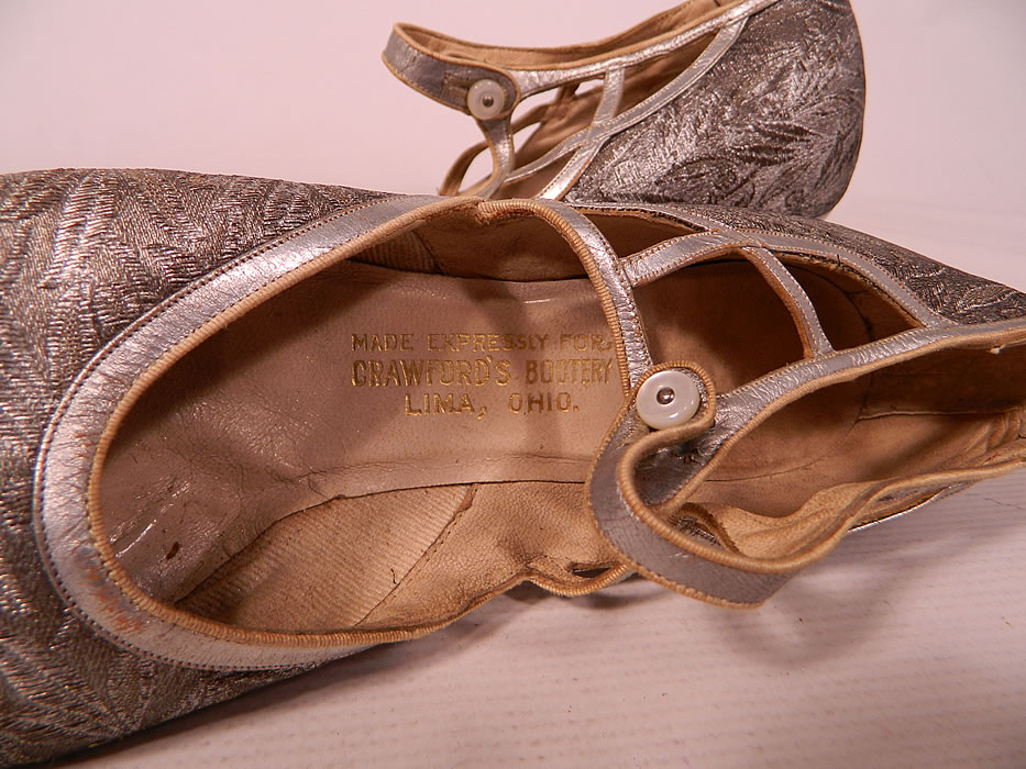 Vintage Silver Leather Lam&eacute; Lame Brocade Button Strap Mary Jane Flapper Shoes
They are lined and have a "Made Expressly For Crawford's Bootery Lima, Ohio" label inside. 
