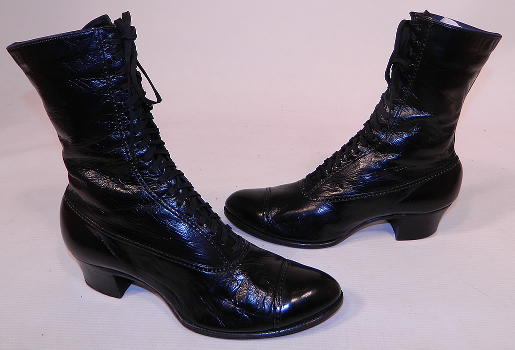 Unworn Victorian Vintage Patrician Label Black Leather High Top Lace-up Boots
This pair of vintage Patrician label unworn Victorian era antique black leather high top lace-up boots dates from 1900. They are made of a supple black leather, with decorative punch work designs.
