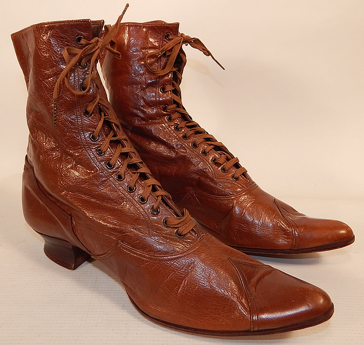 Victorian Antique Womens Brown Leather High Top Lace-up Boots Shoes
The boots measure 7 1/2 inches tall, 10 inches long, 2 1/2 inches wide, with a 1 inch high heel. 