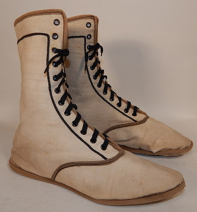 Edwardian Ecru Cream Cotton Canvas Sporting Swim Shoes Bathing Boots
These wonderful womans sportswear swim shoes high top bathing boots have eyelet lacing up the front, rounded toes and canvas bottom soles.
