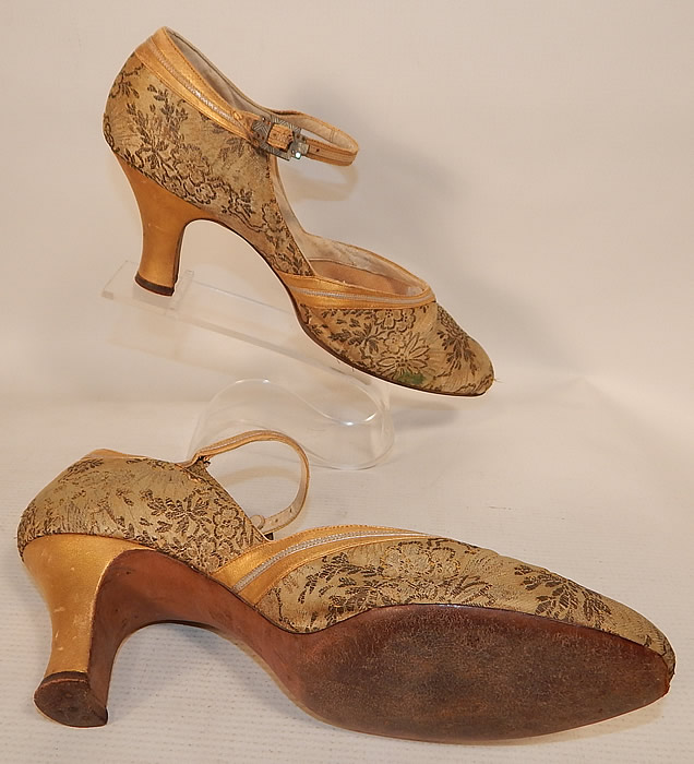 Vintage Saks Fifth Avenue Art Deco Gold Silver Leather Lam&eacute; Lame Brocade Flapper Shoes
The shoes measure 10 inches long, 2 1/2 inches wide, with a 2 inch high heel and are stamped inside a size 5 1/2 A.