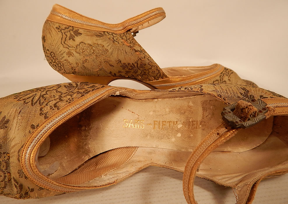 Vintage Saks Fifth Avenue Art Deco Gold Silver Leather Lam&eacute; Lame Brocade Flapper Shoes
They have a "Saks Fifth Avenue" gold embossed label inside. 