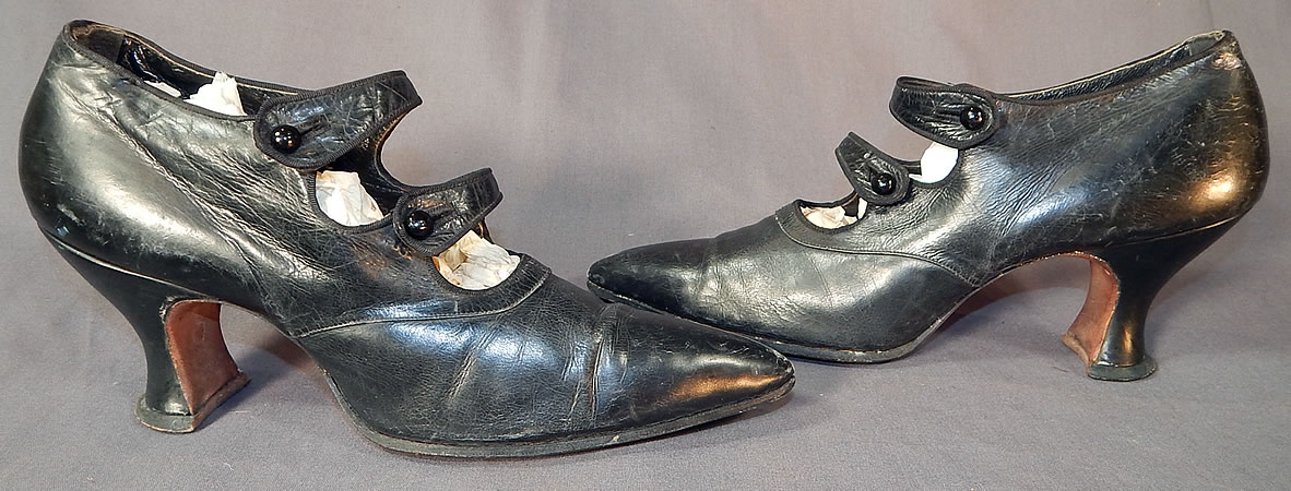 Edwardian Black Leather Double Button Strap Mary Jane Pointed Toe Shoes
These womens Mary Jane style shoes have a double button strap closure across the front instep vamps, exaggerated pointed toes and black leather covered French Louis XV spool heels. 