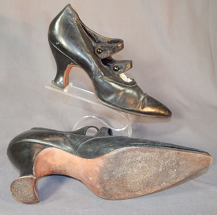 Edwardian Black Leather Double Button Strap Mary Jane Pointed Toe Shoes
The shoes measure 10 1/2 inches long, 2 1/2 inches wide, with a 2 1/2 inch high heel. They are stamped inside a size 6 AAA narrow width. The shoes have been gently worn and are in good condition, with only some slight wear, scuffs on the toes. These are truly beautiful quality made shoe!