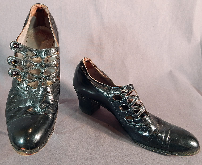 Edwardian Martha Washington Mayer Black Leather Lattice Button Strap Shoes
These beautiful black womens shoes have lattice eyelet cut out straps across the instep front vamps with black shoe button side closures and stacked black wooden cube heels. 