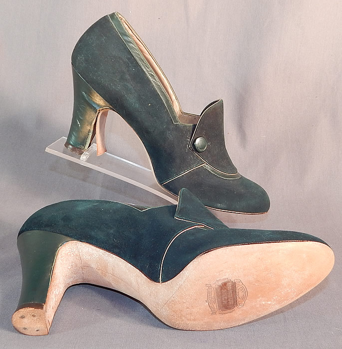 Vintage Art Deco Dark Green Suede Leather Button Trim Unworn Shoes
These lovely ladies shoes have a slipper slip on style with wide shoe tongues, green button trim front instep vamps and green leather covered modified boulevard high heels. 