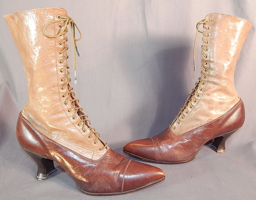 Victorian Antique Brown Two Tone Leather High Top Lace-up Boots Shoes
They are made of a supple two tone brown, and tan color leather. These beautiful boots have pointed toes, the original khaki tan shoe string laces for closure and stacked wooden spool heels. 