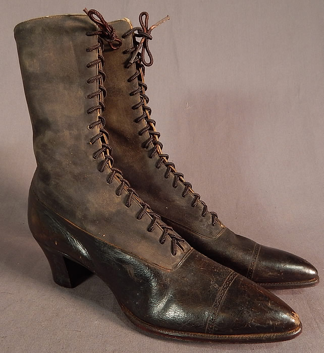 Victorian T.E. Mosely Co Gray Suede Black Leather High Top Lace-up Boots Shoes
This pair of antique Victorian era T.E. Mosely Co. gray suede black leather high top lace-up boots shoes dates from 1900.