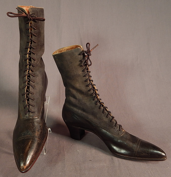 Victorian T.E. Mosely Co Gray Suede Black Leather High Top Lace-up Boots Shoes
These beautiful boots have pointed toes, the original black shoe string laces for closure and stacked wooden cube heels. 