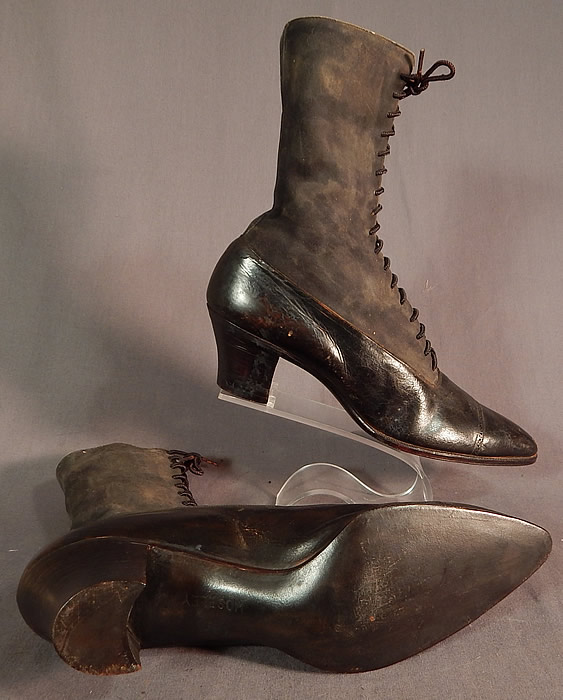 Victorian T.E. Mosely Co Gray Suede Black Leather High Top Lace-up Boots Shoes
The boots measure 10 inches tall, 11 inches long, 3 inches wide, with 2 inch high heels. They are in good unworn condition and are old store stock. The suede leather is dirty with dust from age and storage and there are some scuffs on the shoes. These are truly a wonderful, wearable, quality made antique boot!