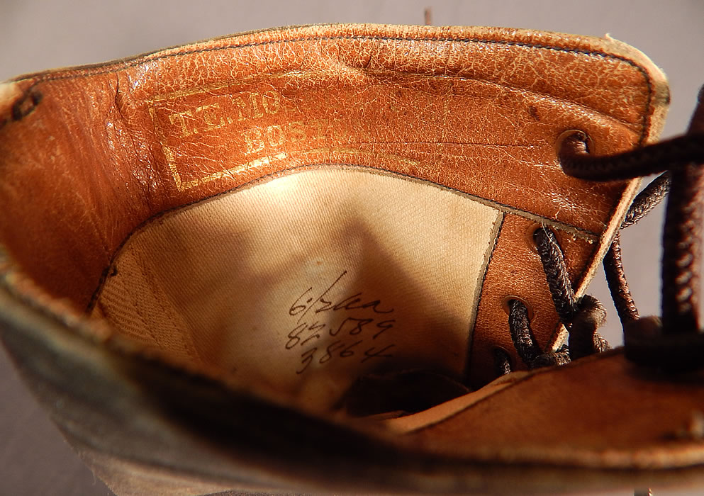 Victorian T.E. Mosely Co Gray Suede Black Leather High Top Lace-up Boots Shoes
They are stamped inside the leather trimmed tops "T.E. Mosely Co. Boston" in gold embossed lettering and marked a size 6 1/2 AA. 