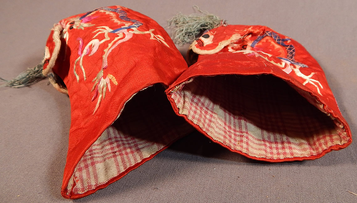 Antique Chinese Child's Red Silk Embroidered Dragon Baby Booties Boots Shoes
They are in good condition, gently worn, with only some slight wear and soiling. The shoes are a beautiful piece of antique Chinese textile art and would make for a wonderful display piece! 
