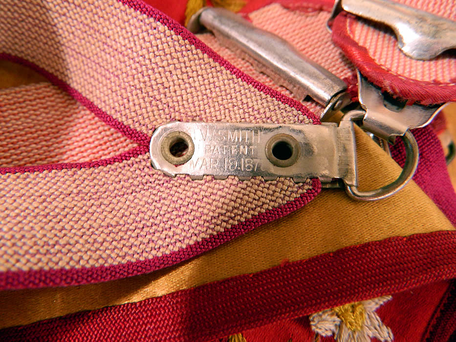 Victorian Mens Red Silk Embroidered Daisy Braces Suspenders close up.