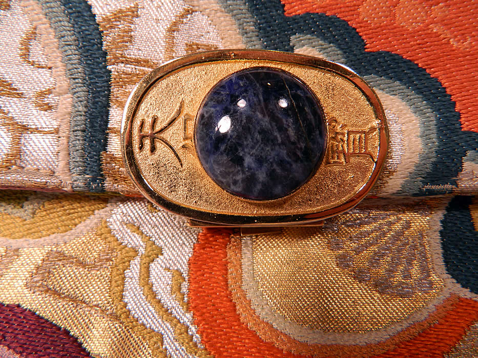Antique Vintage Gumps Japanese Silk Brocade Obi Fabric Clutch Evening Purse. There is a gold Japanese character clasp closure set with a blue agate stone and stamped on back Made in Japan and Gump's. 