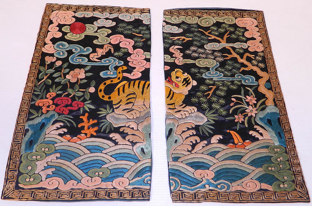 Antique Chinese Silk Embroidered Tiger Fourth Rank Military Badge Pair. There is a matching pair of badges, with one split in the middle for wearing on the front opening of a robe and are both are backed, lined in blue silk.
