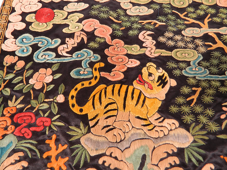 Antique Chinese Silk Embroidered Tiger Fourth Rank Military Badge Pair. The badge is of the tiger which is the symbol of the fourth rank military badge and is a symbol for bravery and courage. 