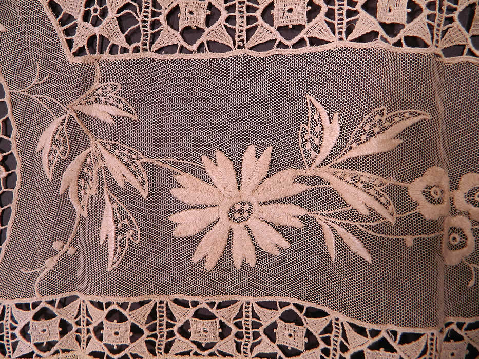 Victorian Antique Point de Venise Lace Floral Bird Net Fringe Drapery Curtain Panel. The curtain panel measures 85 inches long and 47 inches wide, with an additional 6 inch long fringe. It is in good condition. This is truly a wonderful piece of antique lace textile art! 
