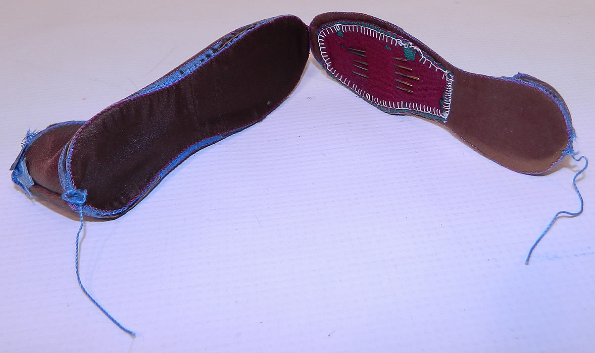 Antique Victorian Sewing Shoe Etui Needle Case Thimble Holder. This rare etui sewing case has been created into a single cube heel shoe, with back tie for opening up and exposing a wool patch pad for holding needles sandwiched inside the inner sole. 