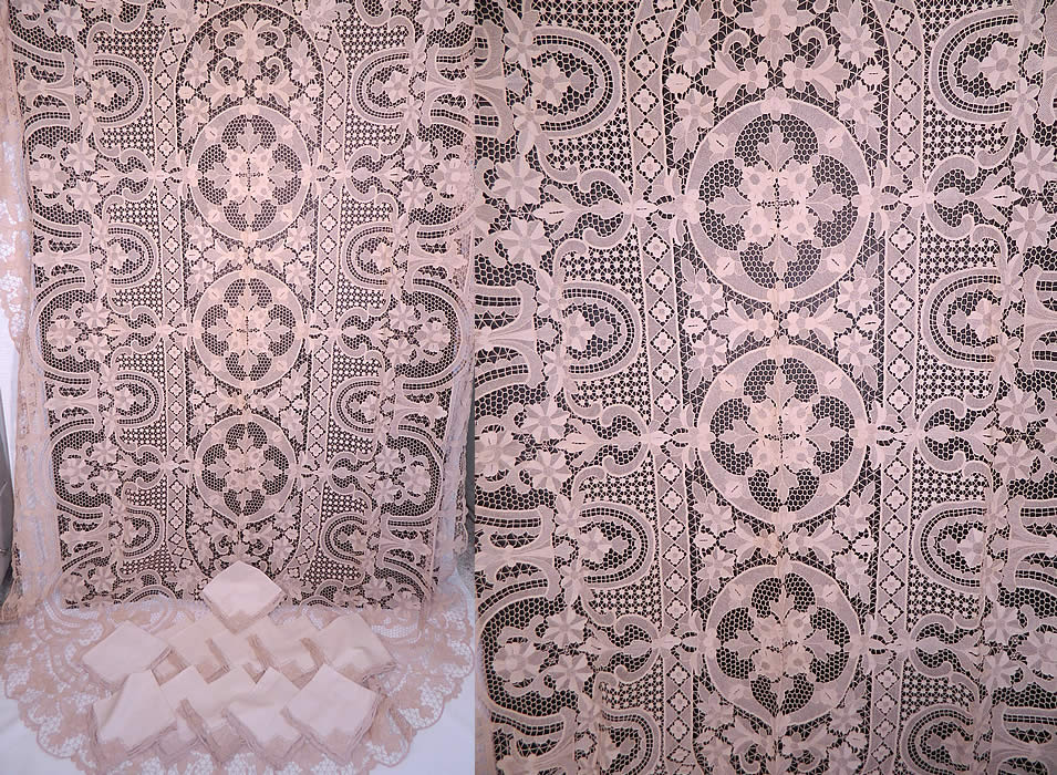 Vintage Antique Point de Venise Lace Banquet Tablecloth & 12 Napkins. This vintage antique Point de Venise lace large banquet tablecloth and 12 napkins dates from the early 1900s. It is made of made of an off white ecru cream color sturdy lace with a heavy outlining cordonnet, buttonhole stitches and connecting brides bars done in a decorative scrolling floral leaf medallion design. 
