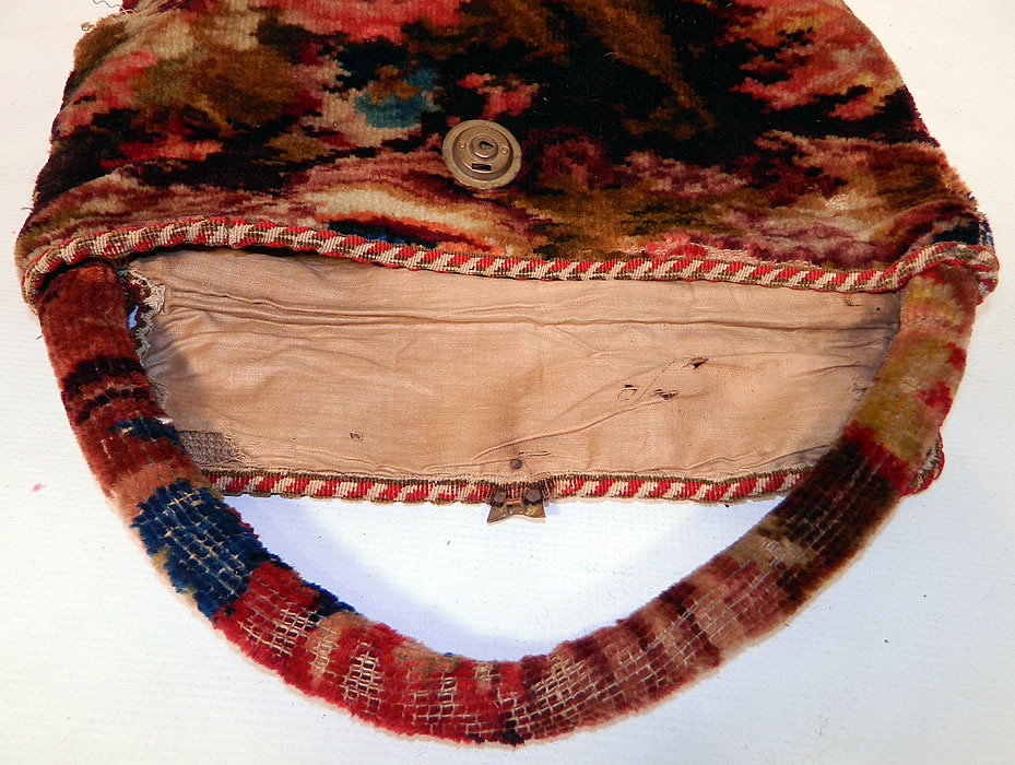 Victorian Antique Civil War Era Document Wool Mohair Carpet Bag Purse. The bag measures 16 by 14 inches. It is in good condition, with some wear and worn spots along the mohair carpet fabric in areas. There is some frayed holes and faint age spots on the inside linen lining. This is truly a rare and amazing  piece of early American antique  textile art!