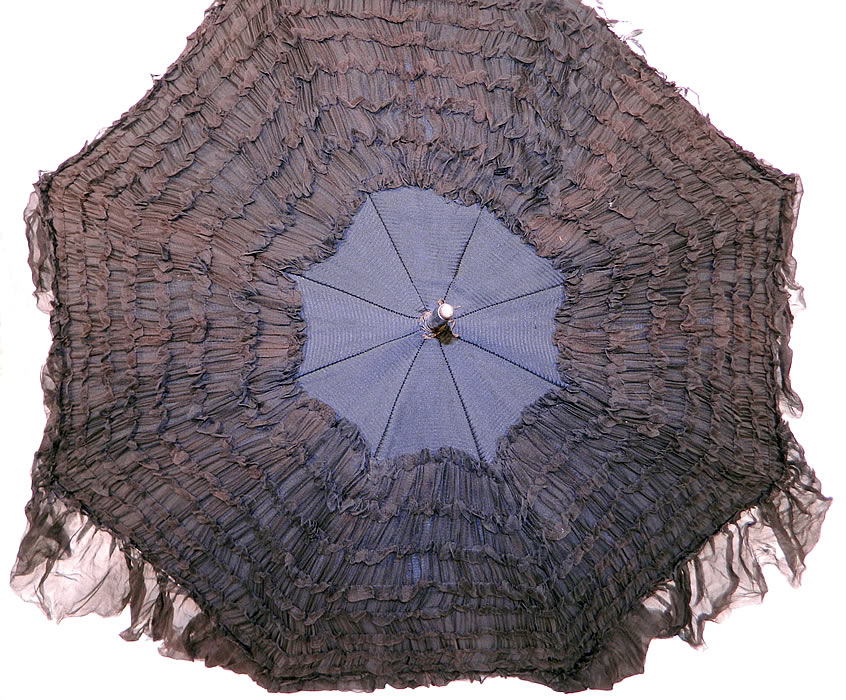 Edwardian Black Silk Ruched Ebony Amethyst Jeweled Handle Parasol. This pretty parasol umbrella has a pagoda dome shape with metal frame and is fully lined inside in black silk. The parasol measures 36 inches long and 88 inches in circumference when opened.