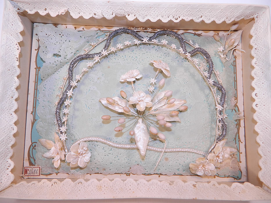 Vintage Parure de Mariee Butterfly Wax Flower Bridal Wedding Tiara Headpiece Box. The tiara headpiece is made of off white cream color wax orange blossom flower droplets, velvet flowers attached to a white wrapped wired base headband, with tiny silver beads wrapped around the scalloped crown top.