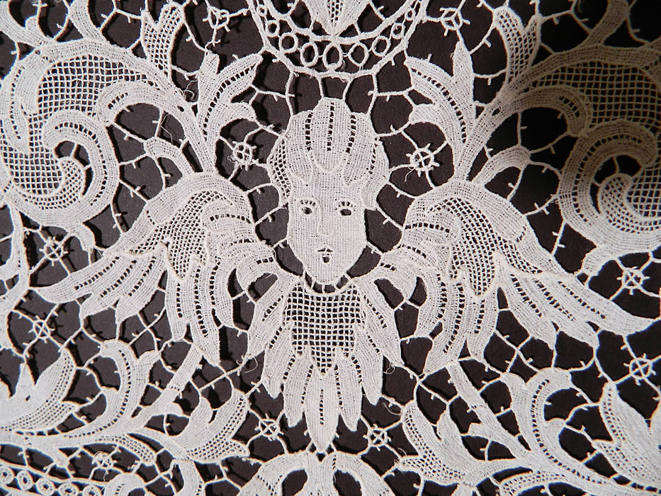Victorian Antique Point de Venise Lace Renaissance Cupid Linen Round Tablecloth. This lovely lace round tablecloth table cover measures 45 inches wide and is 143 inches in circumference. 