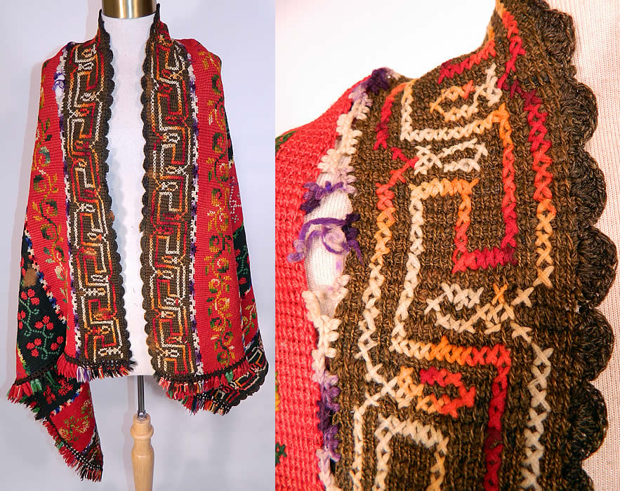 Victorian Antique Colorful Wool Hand Knit Embroidered Fringe Striped Shawl Blanket. There is decorative cross stitching, with a Greek key style border, floral vine leaf, cherries and geometric diamond designs. This stunning shawl stole winter wrap blanket has wonderful workmanship and detail with a multicolor decorative fringed border on the two ends and scalloped edging on the other two sides.