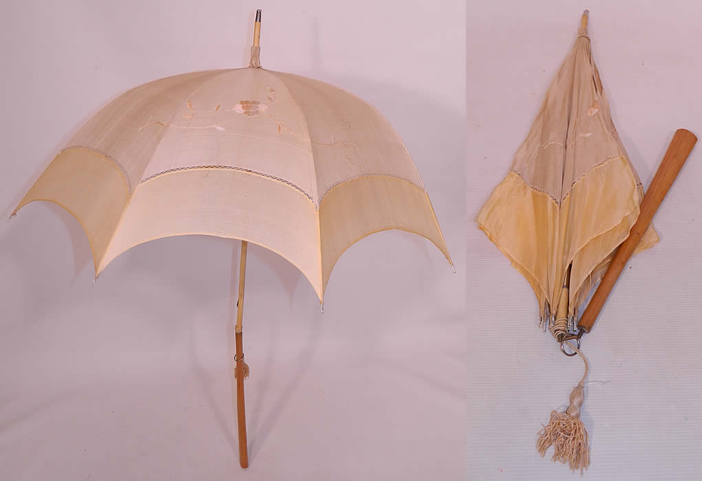 Edwardian Ecru Cream Silk Embroidered Folding Wood Handle Pagoda Parasol. This Edwardian era antique ecru cream silk embroidered folding wood handle pagoda parasol dates from 1910. It is made of an ecru and cream color silk fabric, with drawn cut work edging and pale pastel peach silk raised padded satin stitch embroidery work flowers.