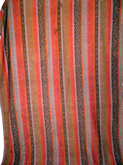 Victorian Antique Jacquard Hand Loom Wool Paisley Striped Shawl Banquet Size
This Victorian era antique jacquard hand loom wool paisley striped shawl banquet size dates from the late 19th century. It is made of jacquard hand loomed woven wool done in strong bright vivid vibrant colors of red, green, orange, turquoise blue, black and white.