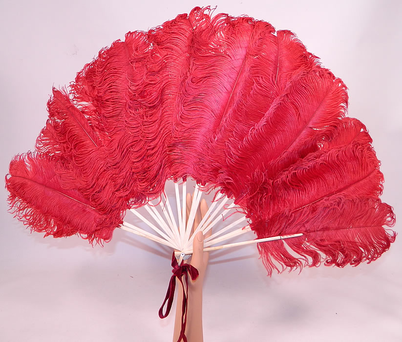 Antique Edwardian Red Ostrich Feather Folding Fan Velvet Ribbon
This antique Edwardian era red ostrich feather folding fan and velvet ribbon dates from 1910.